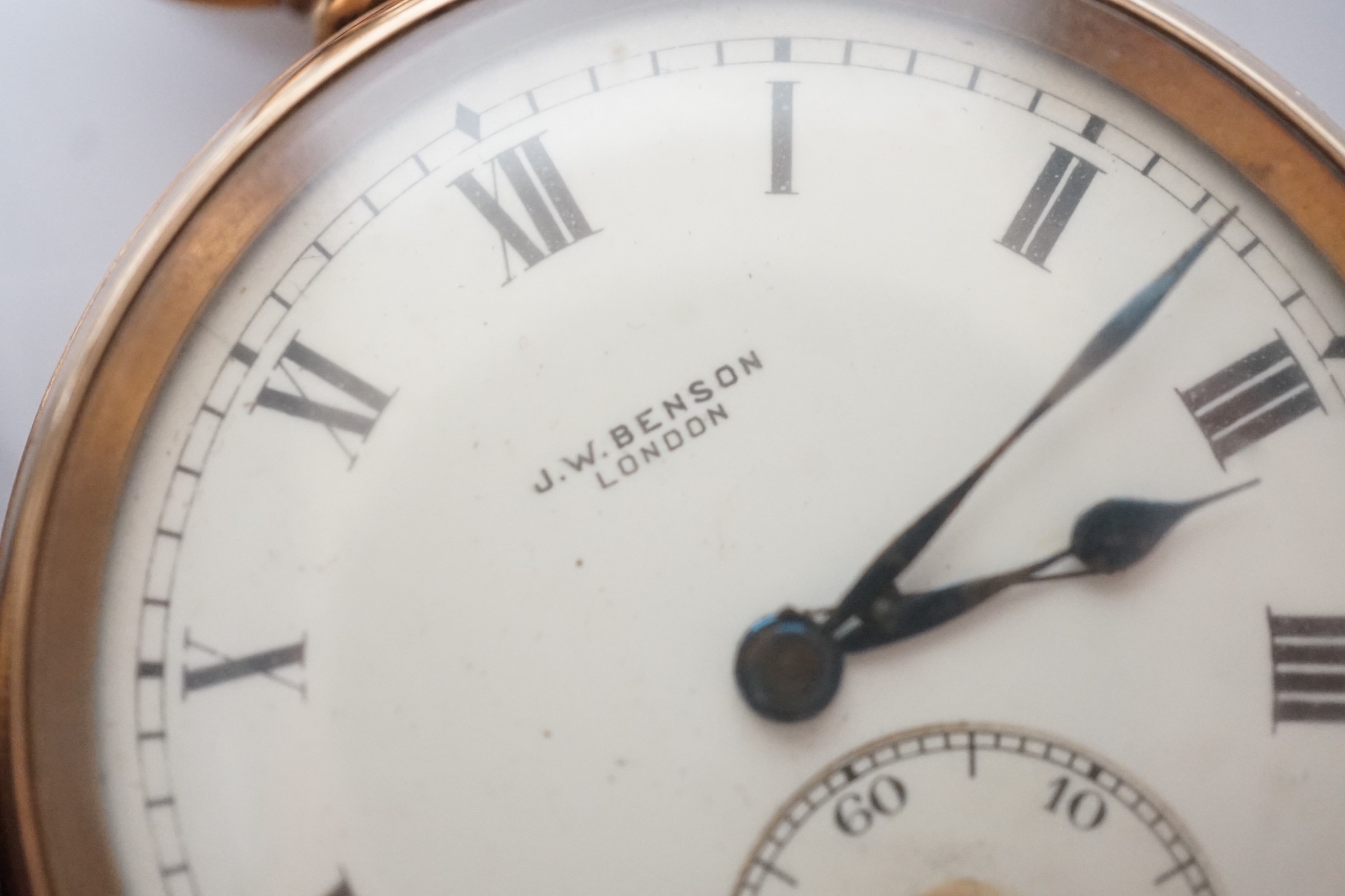 A George V J.W. Benson 9ct gold open faced pocket watch (a.f.), with interior personalised inscription, case diameter 48mm, gross weight 85.7 grams, together with a late Victorian silver open faced pocket watch.